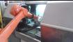 12 06412 Dvouvřetenový soustruh s robotickou manipulací